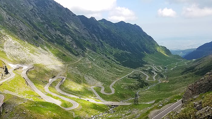 image of a winding mountain road, the Transfăgărășan Highway in Romania