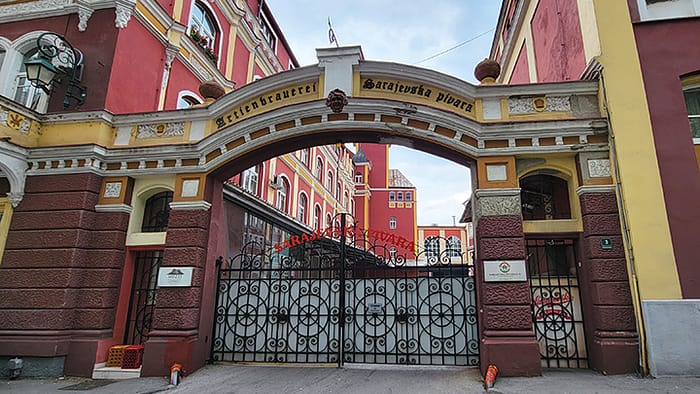 Image of the gates leading into the Sarajevska Brewery