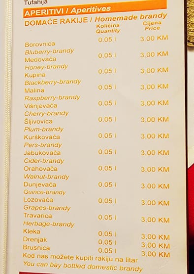 picture of a Balkan food menu listing the different flavors of rakije available